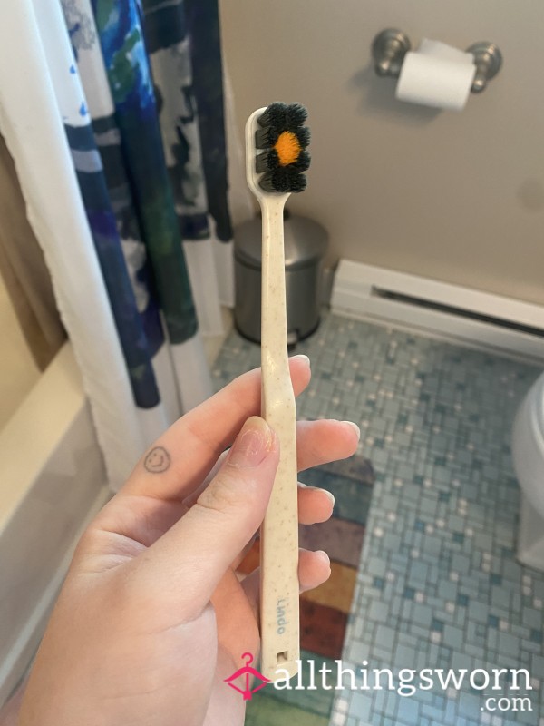 Used Charcoal Toothbrush
