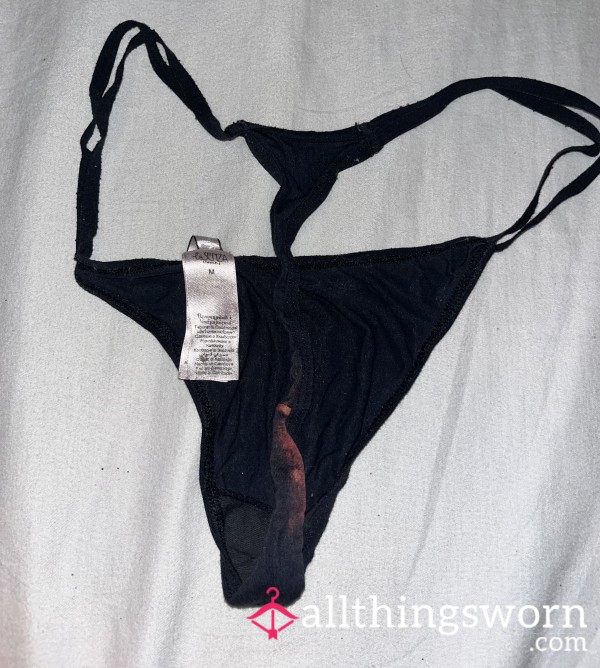 Well Worn G-string Thong With Bleach Stain.