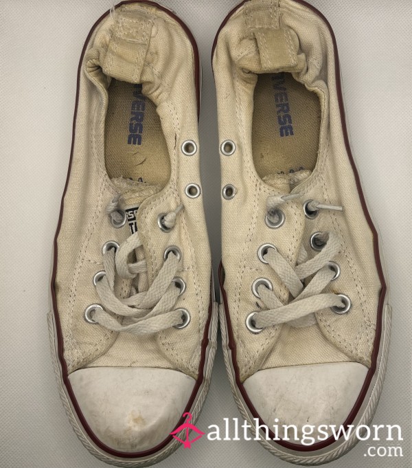 Well-worn White Converse Sneakers