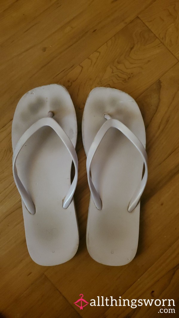 Well-Worn White Flip Flops