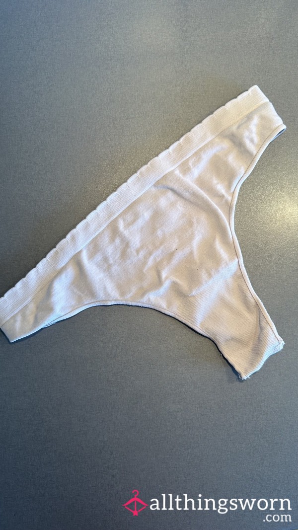 Worn And Washed Out White Thongs