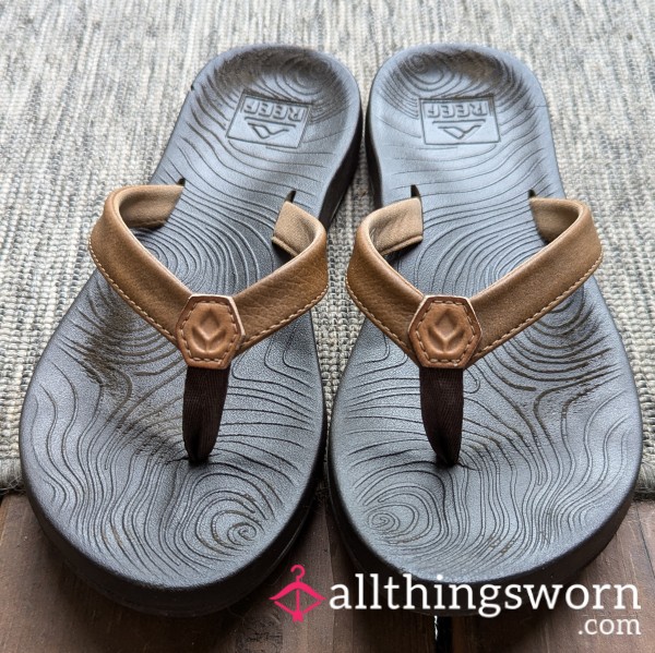 Worn Brown Flip Flops